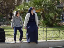 Sr. Victoria Kovalchuk with a refugee girl in Athens, Greece in April 2021.